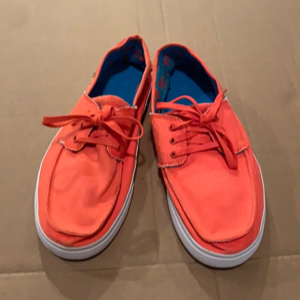 Bright orange Sanuk shoes for men